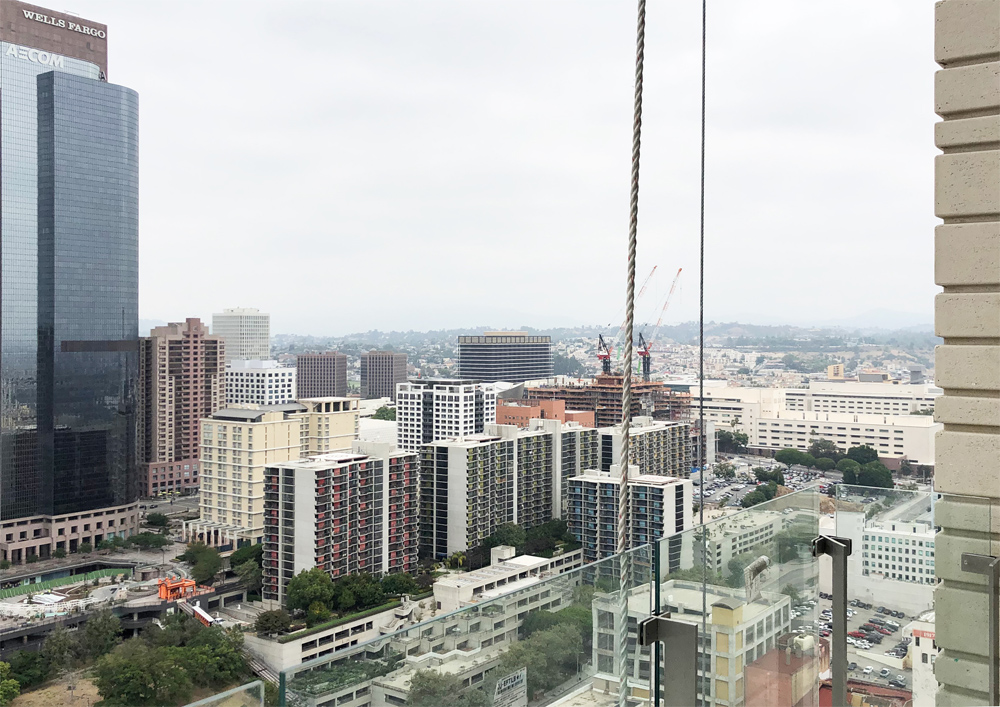 PerlaOnBroadway's tweet photo. Sneak peek. View from the top – 35th floor that is. Generously sized balconies extend your living space outdoors. And off in the distance, the iconic Frank Gehry building, The Grand will soon adorn this city view. #UnderConstruction #PerlaOnBroadway #DTLARealEstate https://t.co/o46QA1WCg5