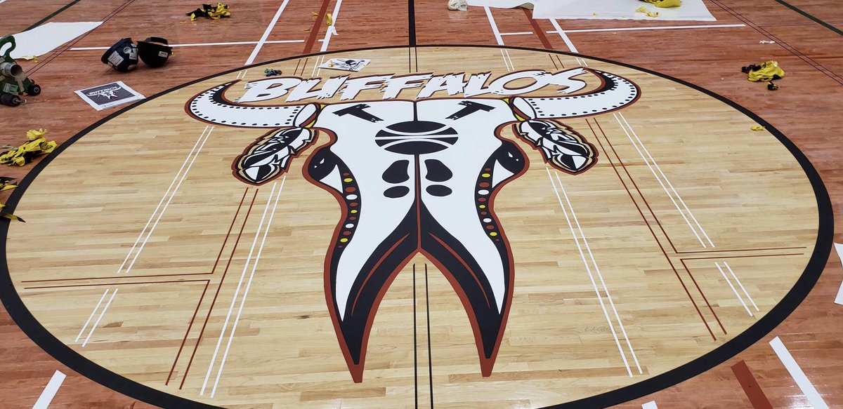 CentaurNation's tweet photo. Work nearly complete at Tsuu T’ina High School. Great looking logo w/ cherry stain for centre volleyball court. A new Bio-Cushion Classic Floor. @RobbinsSurfaces  #gymfloor #sportsfloor #sportsflooring https://t.co/28WqVI2EHZ