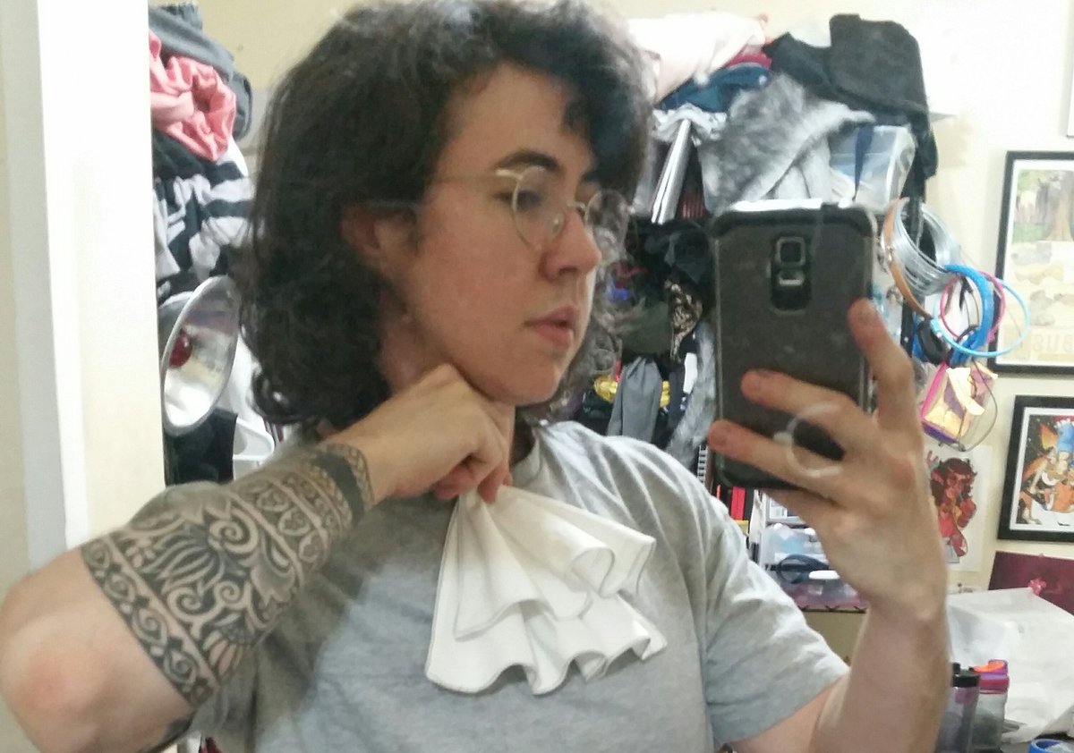 Ok so second test, with a poplin--I wanted to keep that cartoony line but not totally stiff, so I cut an arc of interfacing that got attached right along the hem then heat shaped into wavy ruffles. It needs fussing but I think the effect is good