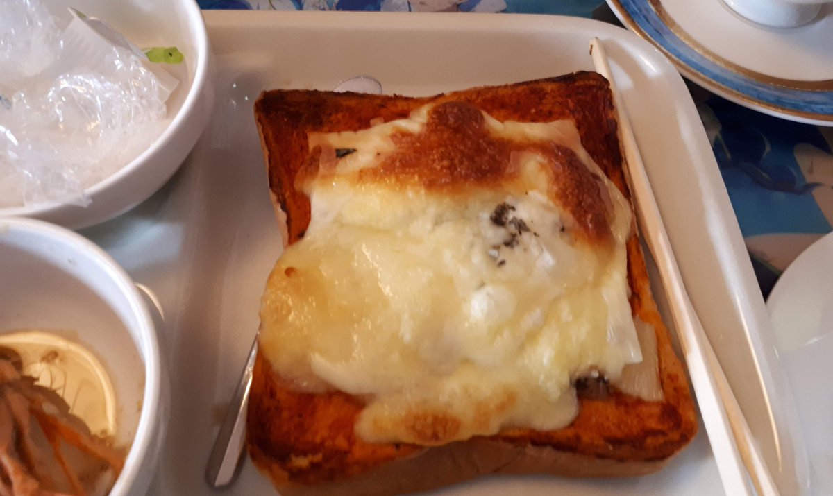 Cheese, mackerel and pineapple on toast for breakfast.