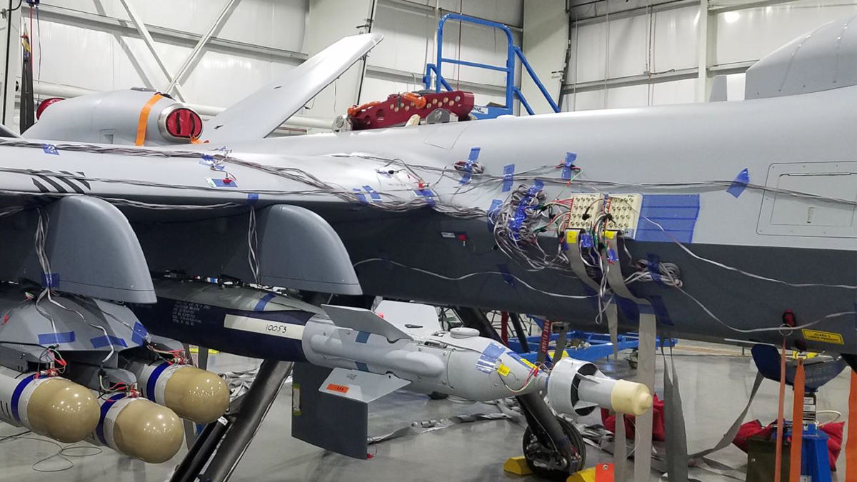 Image shows weapons mounted to the underside of the aircrafts wing