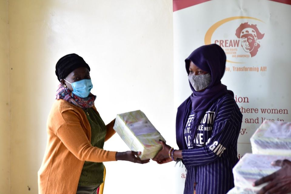 CREAWKenya's tweet photo. Today in Kamkunji and Kibra, we issued out a year supply of menstrual hygiene products to 170 women and girls to enable them manage their menstruation safely, hygienically, and with confidence and dignity. #WithHer https://t.co/Licx7yo9GE
