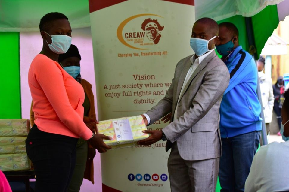 CREAWKenya's tweet photo. Today in Kamkunji and Kibra, we issued out a year supply of menstrual hygiene products to 170 women and girls to enable them manage their menstruation safely, hygienically, and with confidence and dignity. #WithHer https://t.co/Licx7yo9GE