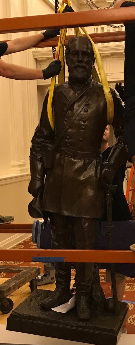 NEW: Crews have removed this statue of Robert E. Lee and eight other Confederate busts from Virginia’s old House of Delegates chamber on orders from Speaker of the House <a href="/EFillerCorn/">Eileen Filler-Corn</a>. The Lee statue was set up to symbolize the moment he accepted command of the Confederate army.