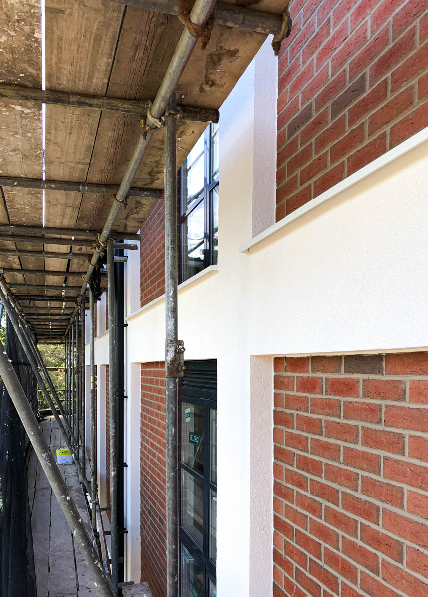 RenderlineLtd's tweet photo. *Project update*: We're almost done transforming this apartment block in Letchworth Garden City with beautiful brick-slips and render from @WetherbyEWI (photos include "before" picture, showing progress).
#brickslips #render #ewi #facades #constructionuk https://t.co/XttIROCXc6