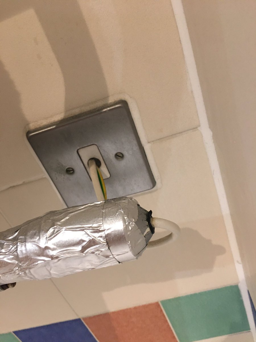 Gxoose's tweet photo. @LEGOLANDWindsor absolutely appalled at the hotel that you have given us as part of our package. Apparently it’s a 4 star hotel and this is in the bath. I’m an electrician and know how dangerous this is! Can’t believe this has been allowed to happen https://t.co/2MTkyKaffa