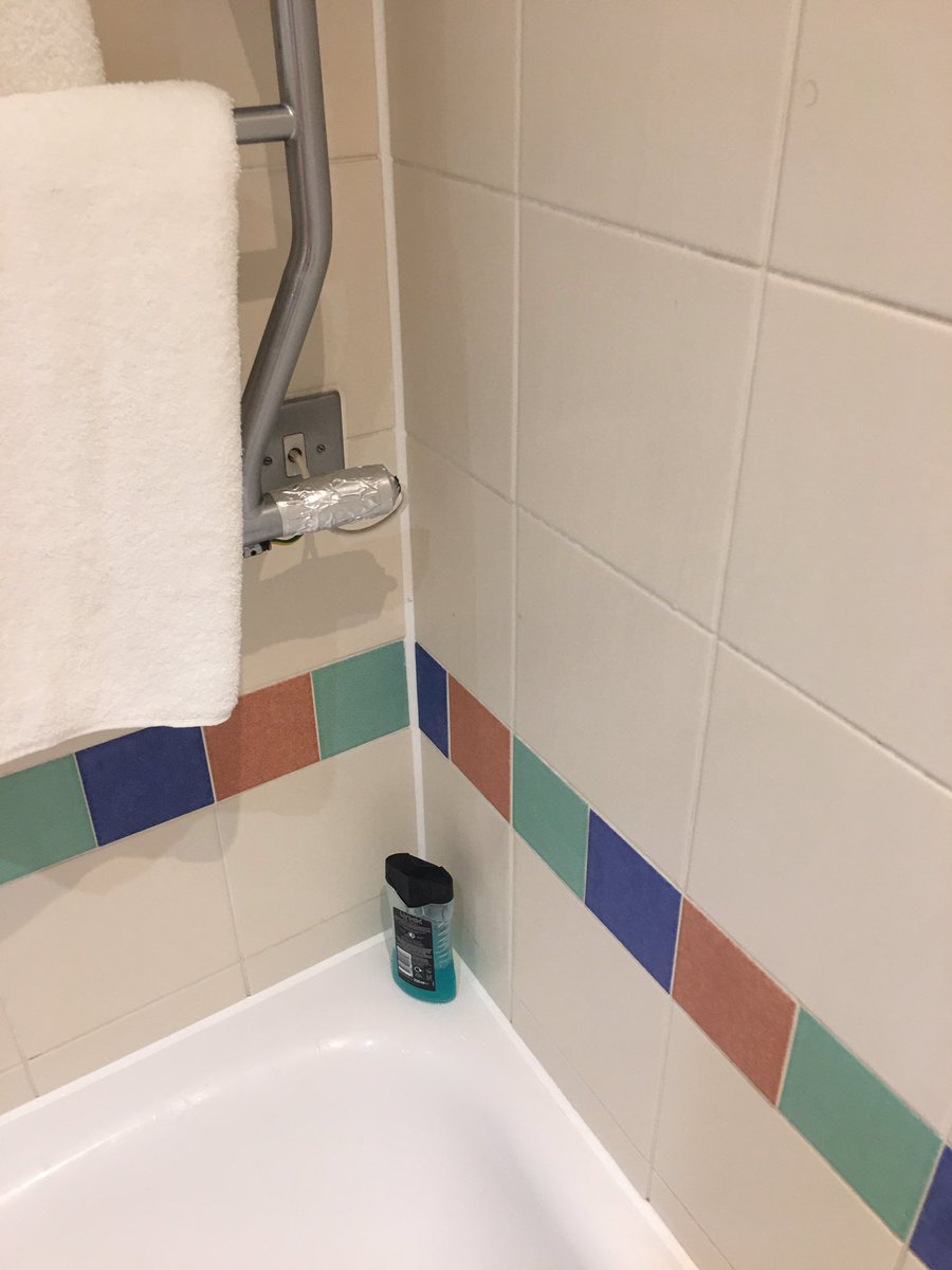 Gxoose's tweet photo. @LEGOLANDWindsor absolutely appalled at the hotel that you have given us as part of our package. Apparently it’s a 4 star hotel and this is in the bath. I’m an electrician and know how dangerous this is! Can’t believe this has been allowed to happen https://t.co/2MTkyKaffa