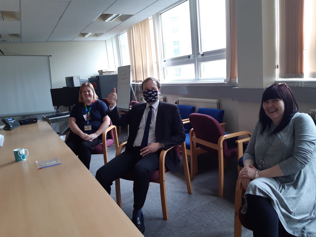 MP <a href="/William_Wragg/">William Wragg</a> enjoying his visit to Stockport JCP. William looked at our Youth Programme &amp; how the team are supporting local employers. William is sporting his Manchester Bee facemask made by Work Coach Chris, monies raised going to @Jon_Wellspring.  #GM