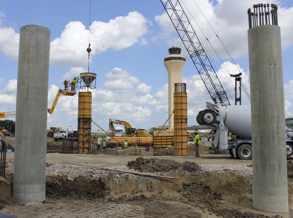 BuildKCI's tweet photo. Crews poured the final two concrete columns on the New Terminal's elevated roadway this week. There's more concrete to come on the elevated roadway structure as deck pours are scheduled to begin next week! #BuildKCI https://t.co/o95Ld08x2r