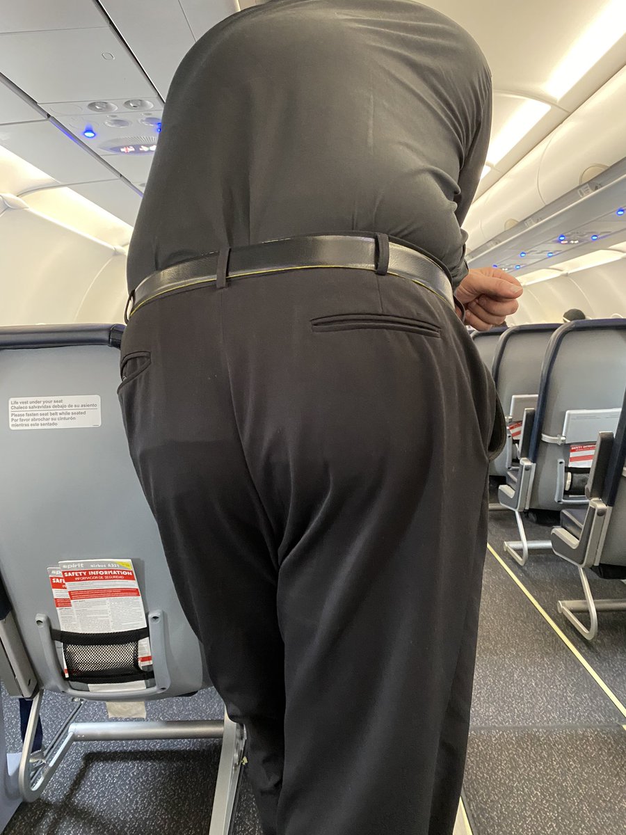 TTWAKyle's tweet photo. @SpiritAirlines this flight attendant stood with his ass in my face and mask below his nose through the entire boarding process. He then missed an unmasked and inebriated passenger fall into the aisle and split her knee open. #travel #socialdistancing https://t.co/3NhAalTwXu