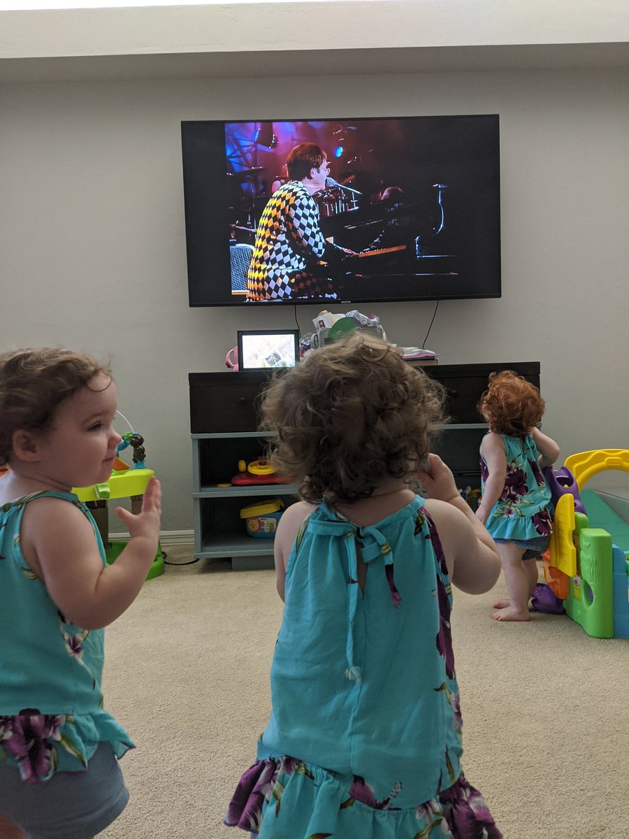 Apaul323's tweet photo. @eltonofficial Introducing the girls to thier first  Elton John 'Concert'. They are in awe to see him in action. 💗 #TriPaulets #Paul5 https://t.co/H5ZQ0OqFFF