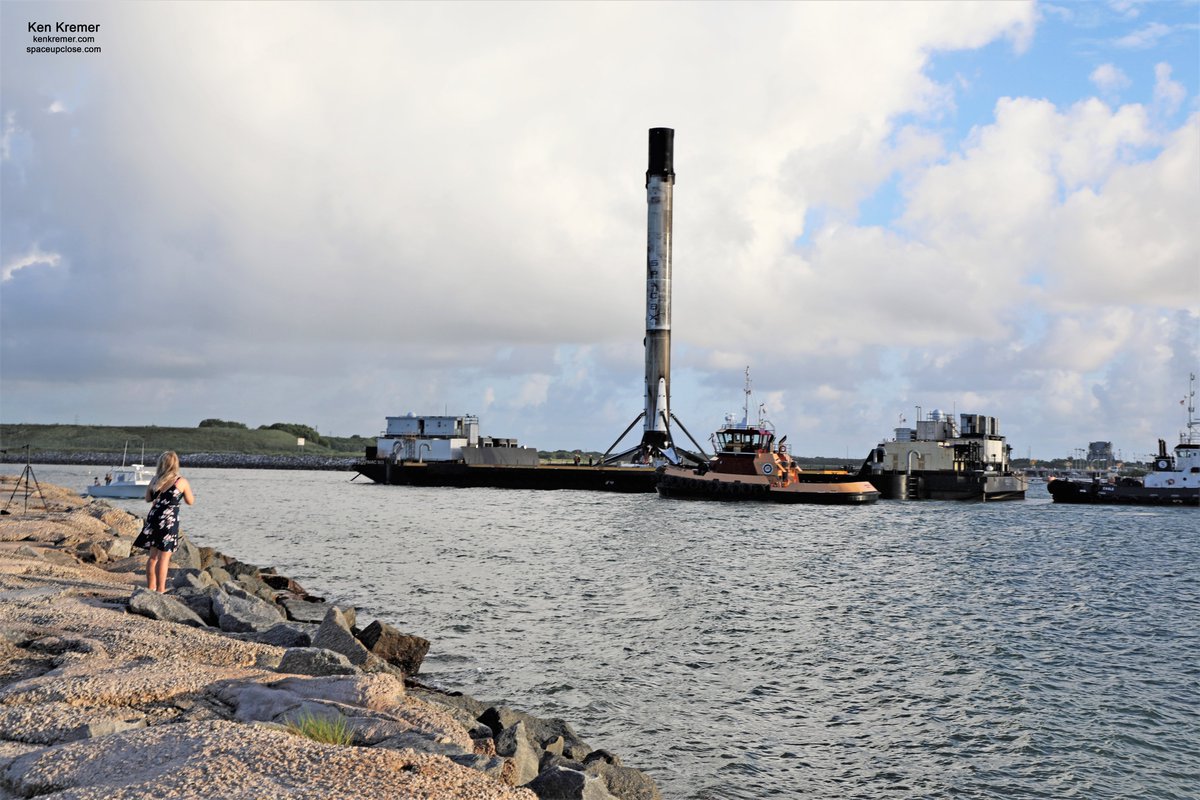 ken_kremer's tweet photo. Pretty Girl On the Rocks with 2 legs enjoys Pretty Sooty Booster On a Droneship with 4 legs - returned atop #JRTI this morning @PortCanaveral from #SpaceX #AnasisII launch https://t.co/J8894UtHDQ