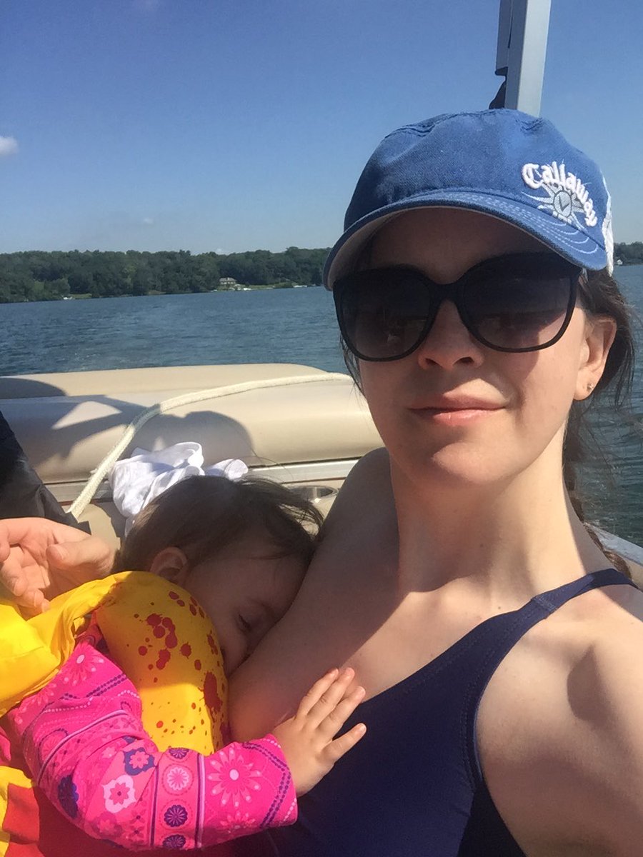 Hi #MedBikini,

Here is a picture of me in a swimsuit nursing my baby which I use to #normalizebreastfeeding in part because I am a physician.