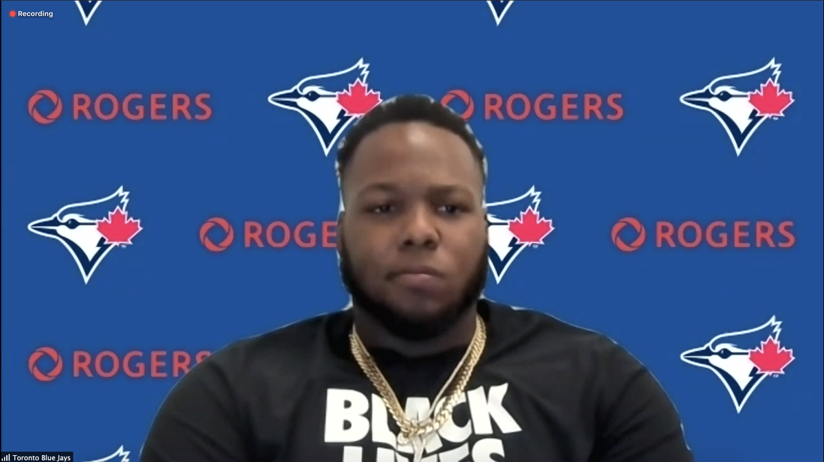 ArdenZwelling's tweet photo. Vladimir Guerrero Jr. wearing a Black Lives Matter t-shirt during his Zoom media availability. He says he plans on taking a knee prior to tonight's game. https://t.co/d9LjNdEctL