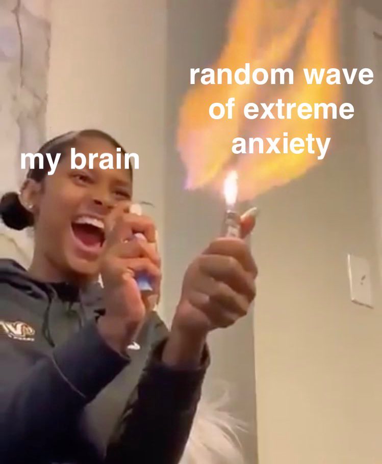 a girl (labeled “my brain”) spraying something into a lighter to make a giant flame (labeled “random wave of extreme anxiety”)