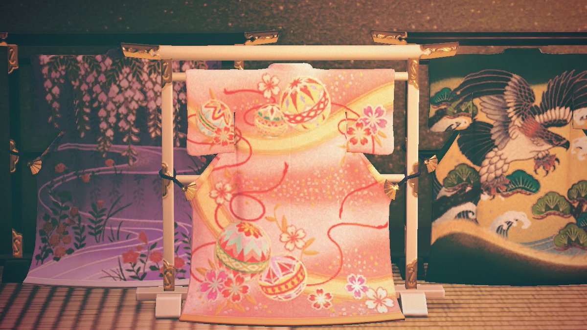 The elaborate kimono stands are decorated with popular kimono motifs like the wisteria, cherry blossoms, pine trees, peonies, and cranes.