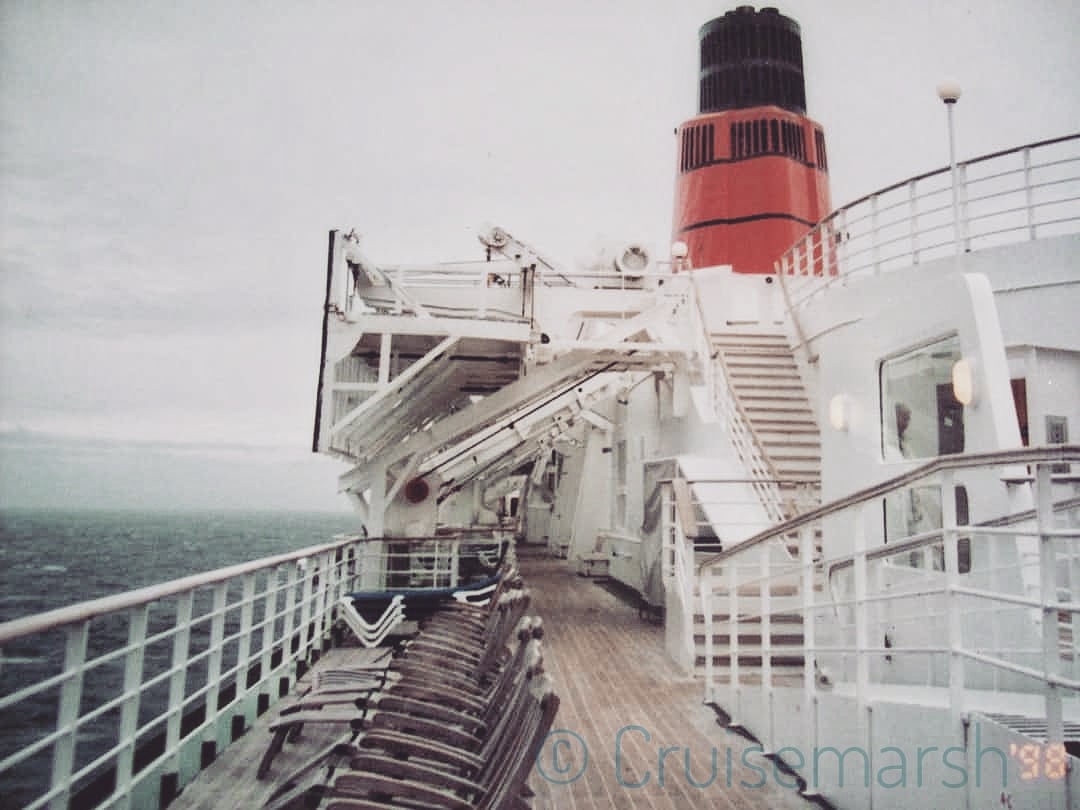 nauticallyspeak's tweet photo. Taking a stroll along the Boat Deck of the former @cunardline icon #QueenElizabeth2 as we sailed for Southampton at the end of our penultimate voyage on her in October 2004.
#Memories #Iconic #QE2 #BoatDeck #TeakDecking #IconicFunnel #Memories #Cruisemarsh https://t.co/8ZJ6QOtzoD