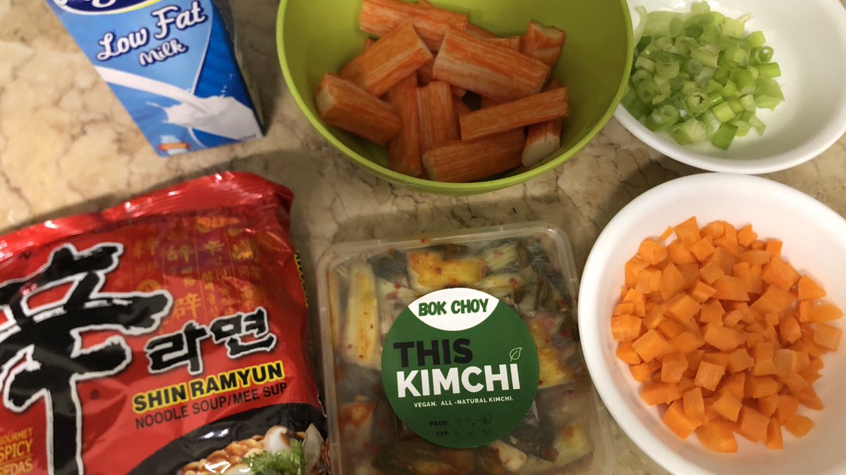 Ingredients: Milk (better to use whole milk but i only had low fat)1 pack of shin ramyuncrabstick (cut in halves)Diced leeks Diced carrotsBok Choy Kimchi (or any kimchi)(Not in photo: 1 tbsp of brown sugar)