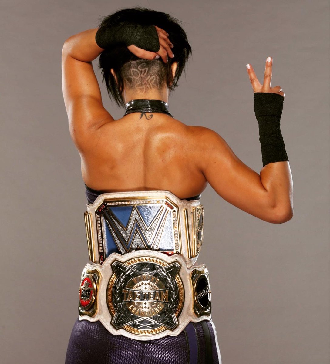 itsBayleyWWE's tweet photo. Are you ready? Are you ready for a good time?!???? #bayleydosstraps #2beltzbanks #SmackDown https://t.co/169wH1vp5q