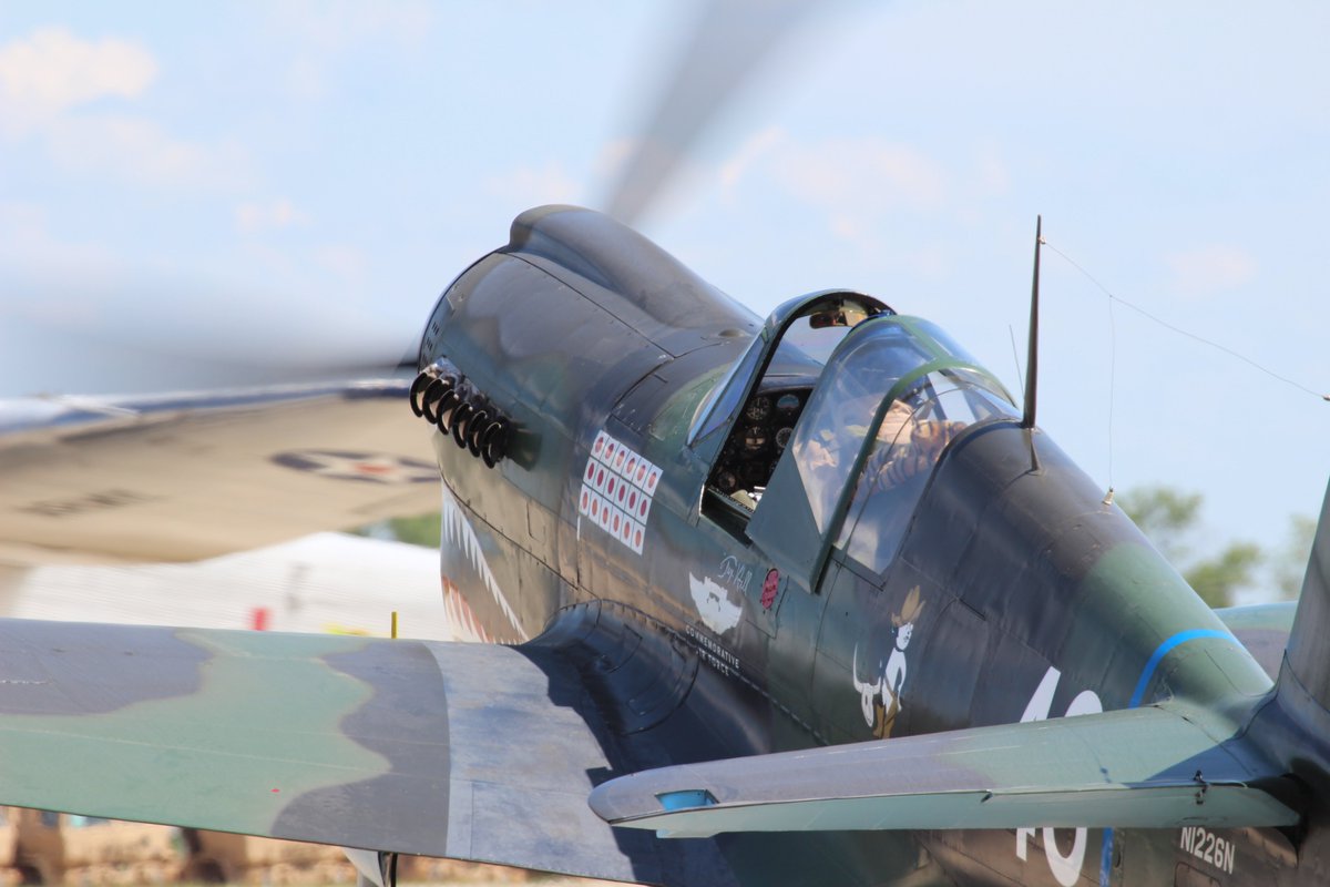 cholubaz's tweet photo. Some Pics of OSH Past #OSH10 some of you by the pics will be able to guess the year because you have a similar pic of the P-40 Warhawk going by the wall of fire. https://t.co/c3R1OSGEpd