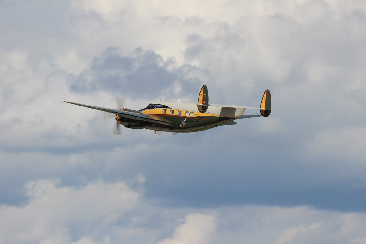 cholubaz's tweet photo. Some Pics of OSH Past #OSH10 some of you by the pics will be able to guess the year because you have a similar pic of the P-40 Warhawk going by the wall of fire. https://t.co/c3R1OSGEpd