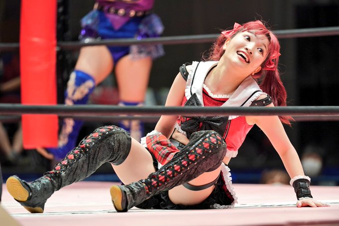 Maki Itoh sitting in a wrestling ring.