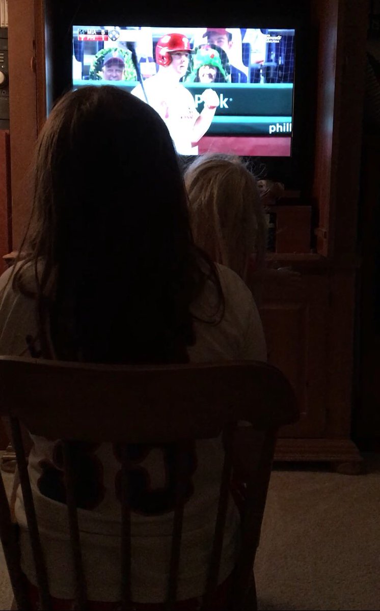 HertzlerMichael's tweet photo. While it’s not the same as being in her favorite spot at CBP cheering on her beloved @Phillies, watching them on TV tonight with her Julie doll is not bad at all. We miss everyone! @TMacPhils @GmurphNBCS @JohnKruk @CARautism #BaseballHeals #EmmaRocksAutism #EaglesAutismChallenge https://t.co/71cAXka4G0