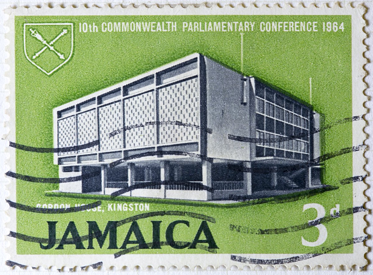 The Jamaican Parliament meets in Gordon House, which looks pretty cool on a lime green stamp. In photos...yikes.