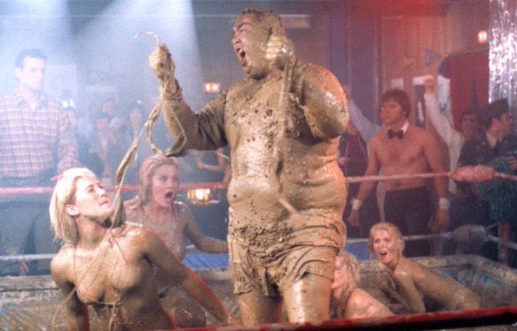 Super70sSports's tweet photo. No sports fan will ever forget Dewey Oxburger’s stunning upset victory in a 4-on-1 mixed gender handicap mud wrestling match. https://t.co/0JHNs144T8