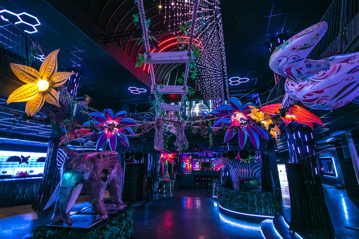 V_Architects's tweet photo. Step into the wild with our tropical Tiki theme, where the jungle glows in UV and the flowers grow larger-than-life. #Tikitheme #Venuetransformation #visualarchitects #decorhire #Props https://t.co/nikXiPJuM3