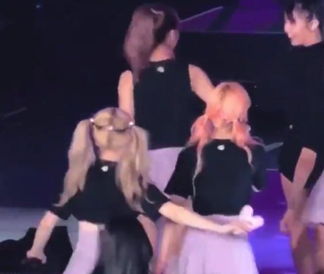 sana remained unbothered cos she knows it's dahyun holding her waist