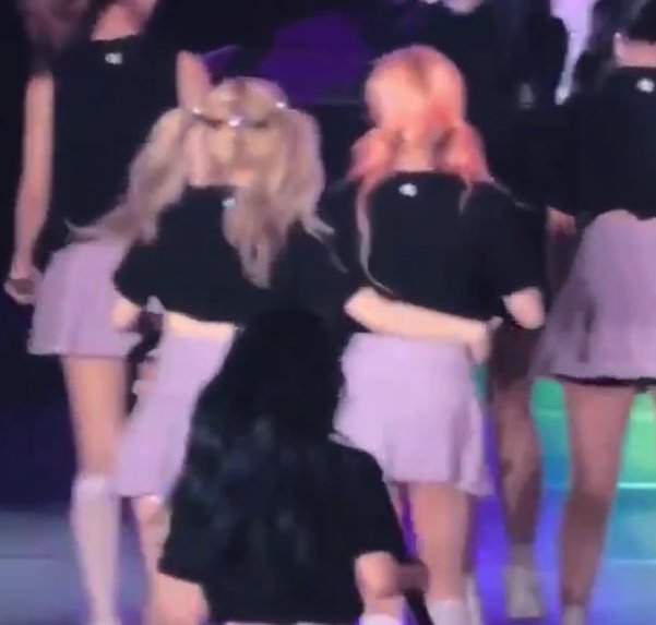 sana remained unbothered cos she knows it's dahyun holding her waist