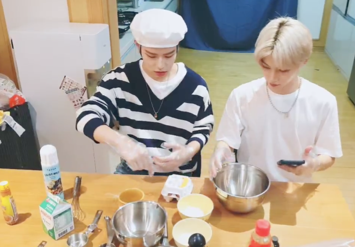 making souffle pancakes at midnight hahaha they're looking at a recipe today! proud of them