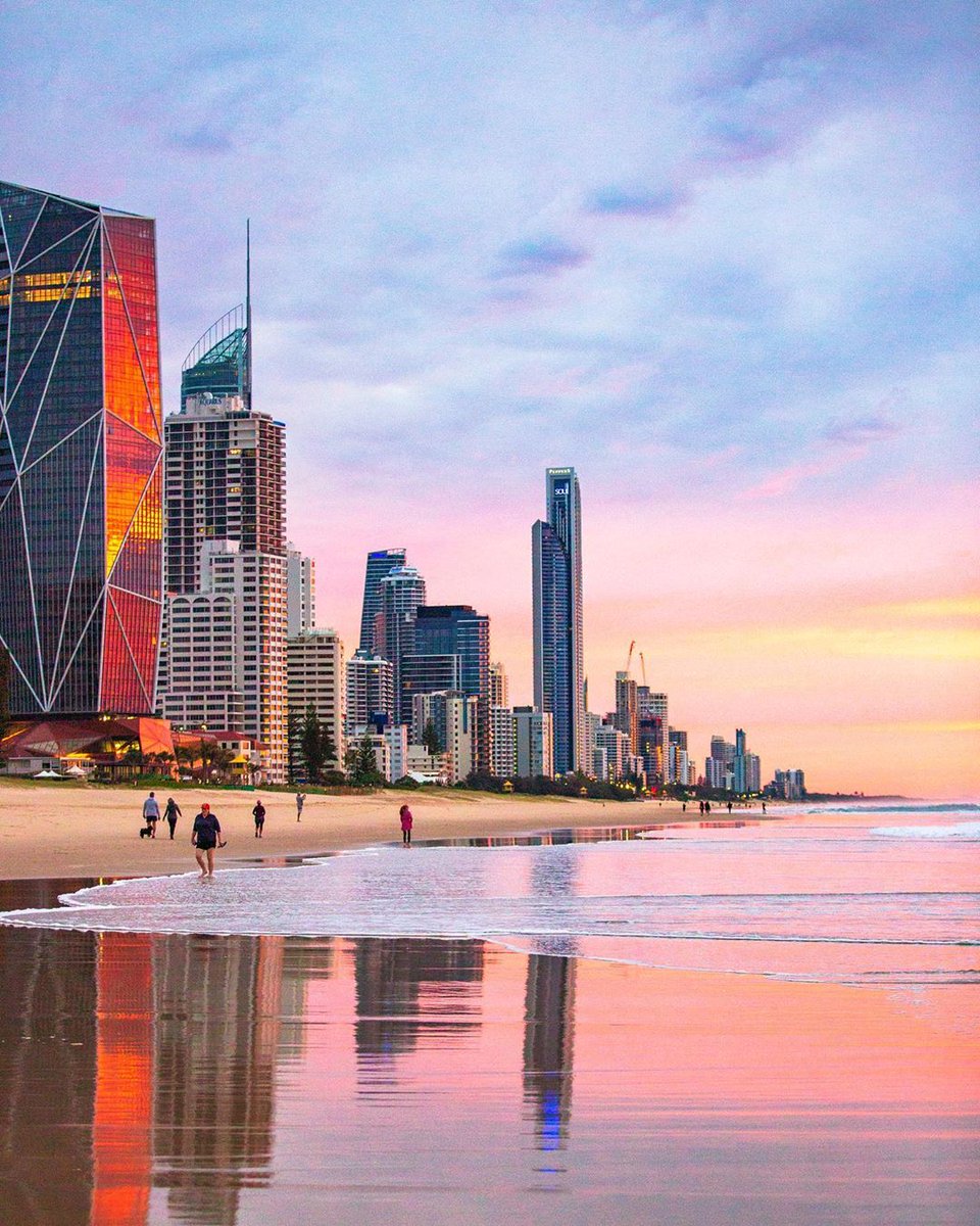 Australia's tweet photo. A #sunrise stroll in #SurfersParadise looks like just the ticket, don’t you think? 

IG/deanjohnson captured this peachy scene in @Queensland's @destgc which is a tad quieter over the winter months, making it a great time of year to visit. 

#seeaustralia #thisisqueensland https://t.co/7OypCzDMf5