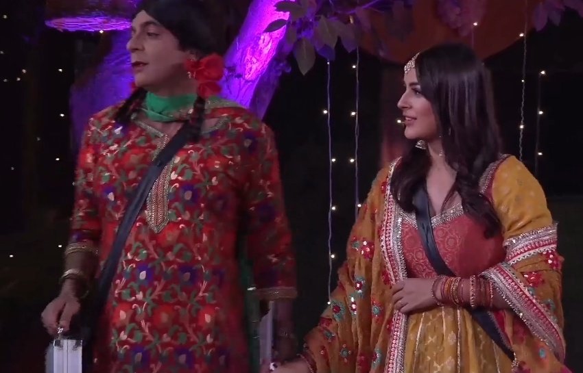 Then came guthi bringing in all wedding dole band baja. Sid was trying hard not hold on to her as she was whisked off to apply MEHNDI. Guthi sensed how nervous both were and in usual style cracked jokes to lighten the mood.