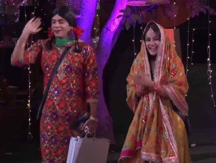 Then came guthi bringing in all wedding dole band baja. Sid was trying hard not hold on to her as she was whisked off to apply MEHNDI. Guthi sensed how nervous both were and in usual style cracked jokes to lighten the mood.