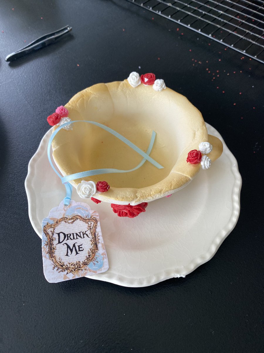 Handmade, edible “tea cup” to put her cupcake/candle in   