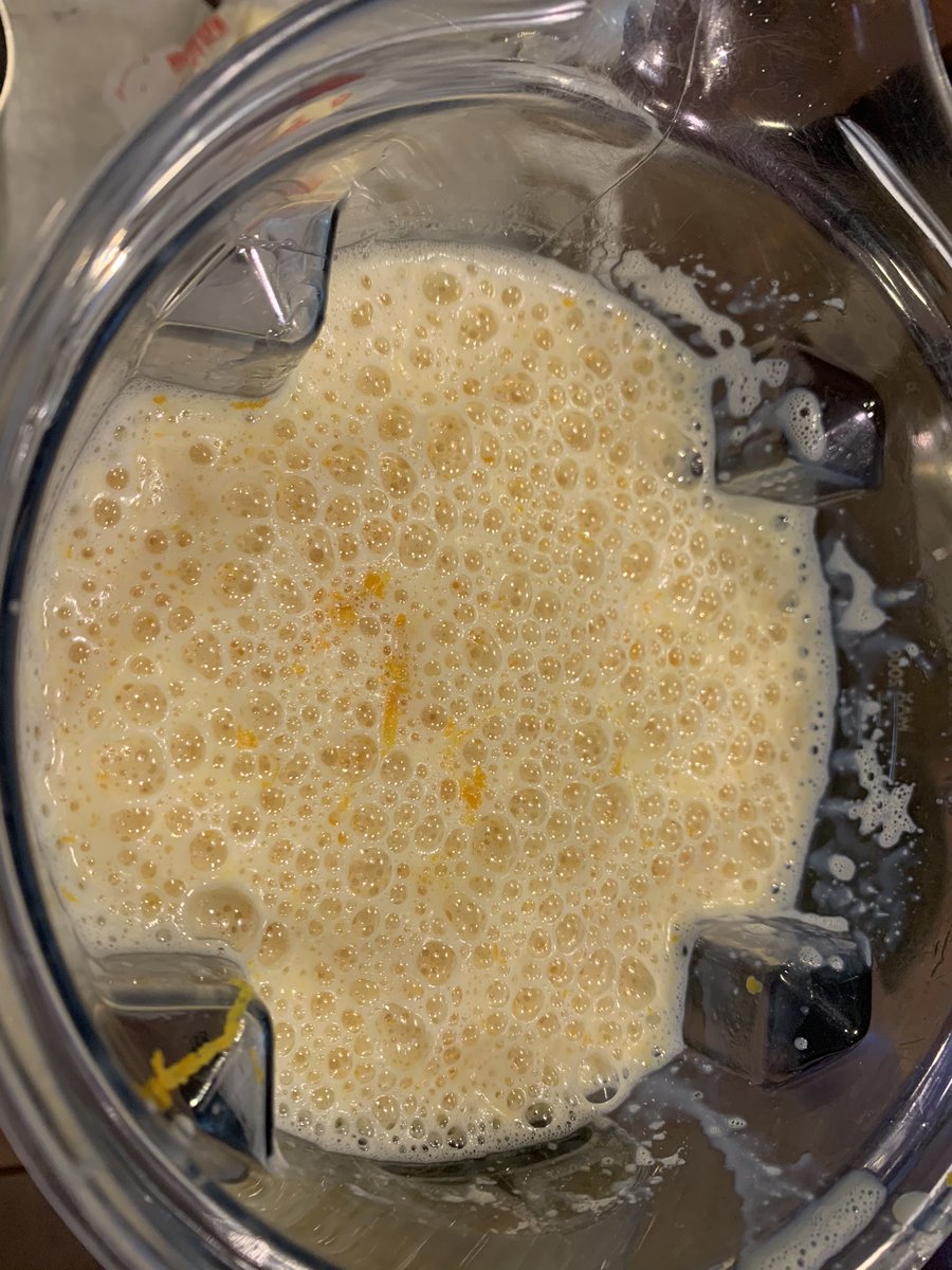This time I made flan de naranja. My husband grated the zest off an orange and added it to the blender. Here’s a picture of the blender with the zest and the naked orange. Who keeps track of these/more