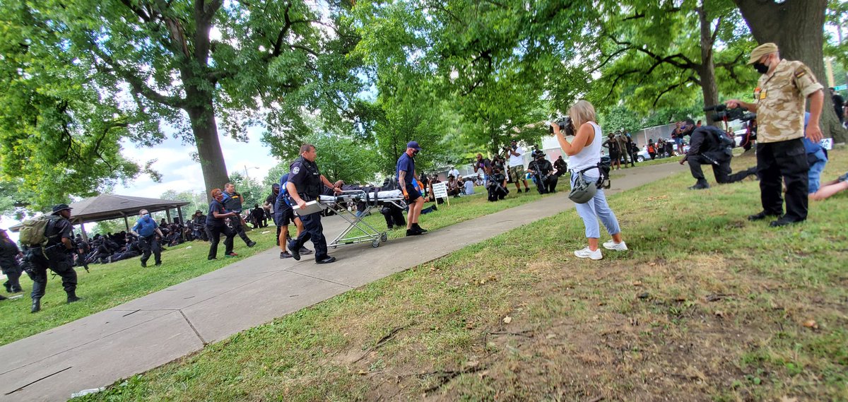 At least two people have been taken away after a single gunshot went off at Baxter Park.