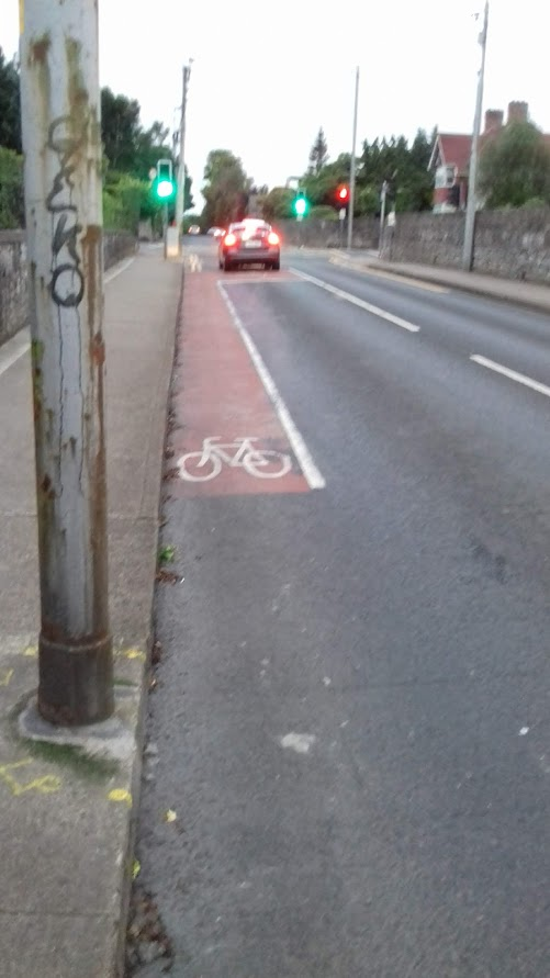 Now 4kms from home and 2.5kms into Limerick City I encounter my second stretch of cycle lane. Another 10m barely -put there to keep bikes out of cars way at the lights. Though I won't pass it today I'm going to count the zebra crossing down by the Salesians as the 2nd one 9/