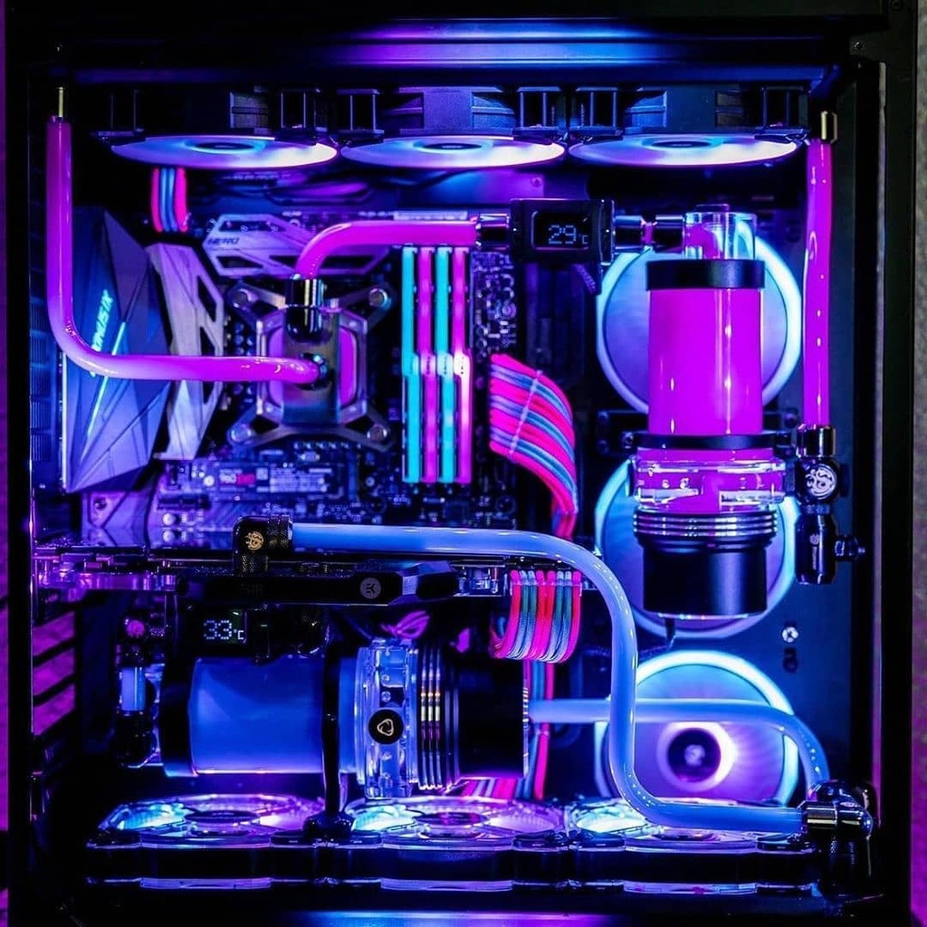 GamerTeesUK's tweet photo. This PC build looks like it came straight from #nightcity. #cyberpunk isn't that far away! You guys excited?

RGB is lit. Celebrate it with our RGB IS LIT Tee - LINK IN BIO🎯

----------
📷: @excellentbuilds - follow these guys for more awesome RGB 
--… https://t.co/5JMSfwSTBD https://t.co/tEc9CCXoyM