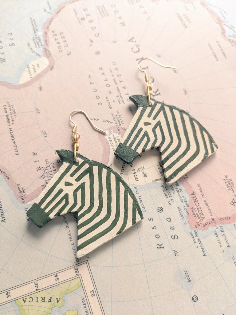 I shaped and painted some clay earrings and it turned out pretty good!