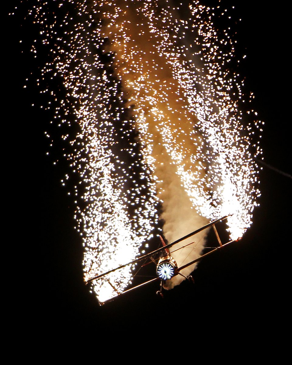 During the week that would have been #OSH20, we figured we'd share some of our favorite throwback photos from Oshkosh through the years! From 2013: Gene Soucy leaves a trail of smoke and fireworks during one of the popular night air shows at AirVenture. 📷 Brady Lane #EAAtogether