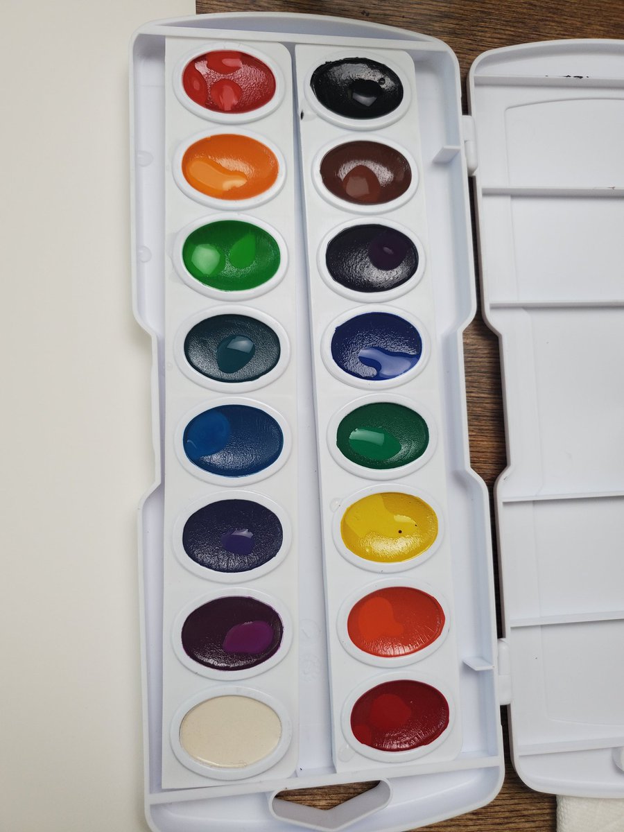 When you get started, the first thing you want to do is add a drop of water to every pan. This is going to activate the pigments. I like to make a switch reference sheet and also test out color mixtures on a small test sheet.