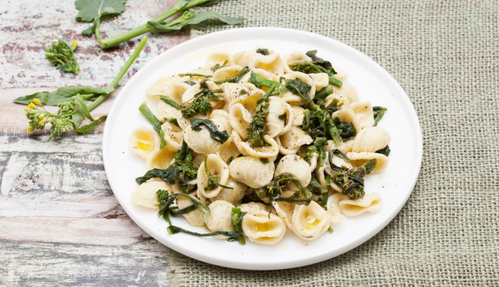 Moving down to Puglia, a famous typical dish are orecchiette ('small ears') alle cime di rapa. As the name says, they are orecchiette - a kind of pasta that indeed looks like ears - with turnip greens. 18/?