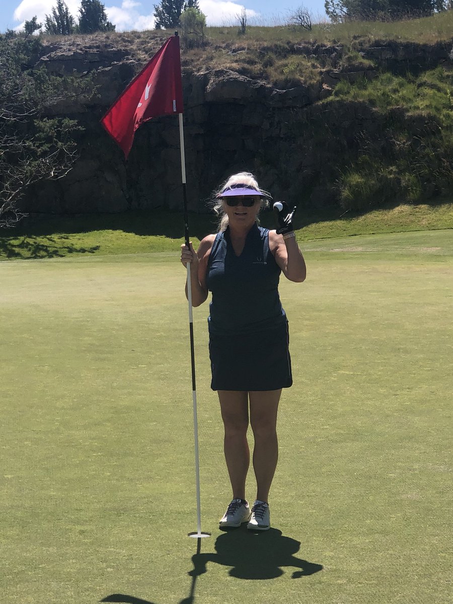 Check out the good looking chick who got a hole-in-one on # 8 pronghorn resort Fazio course. She used a 9 iron 97 yard shot.