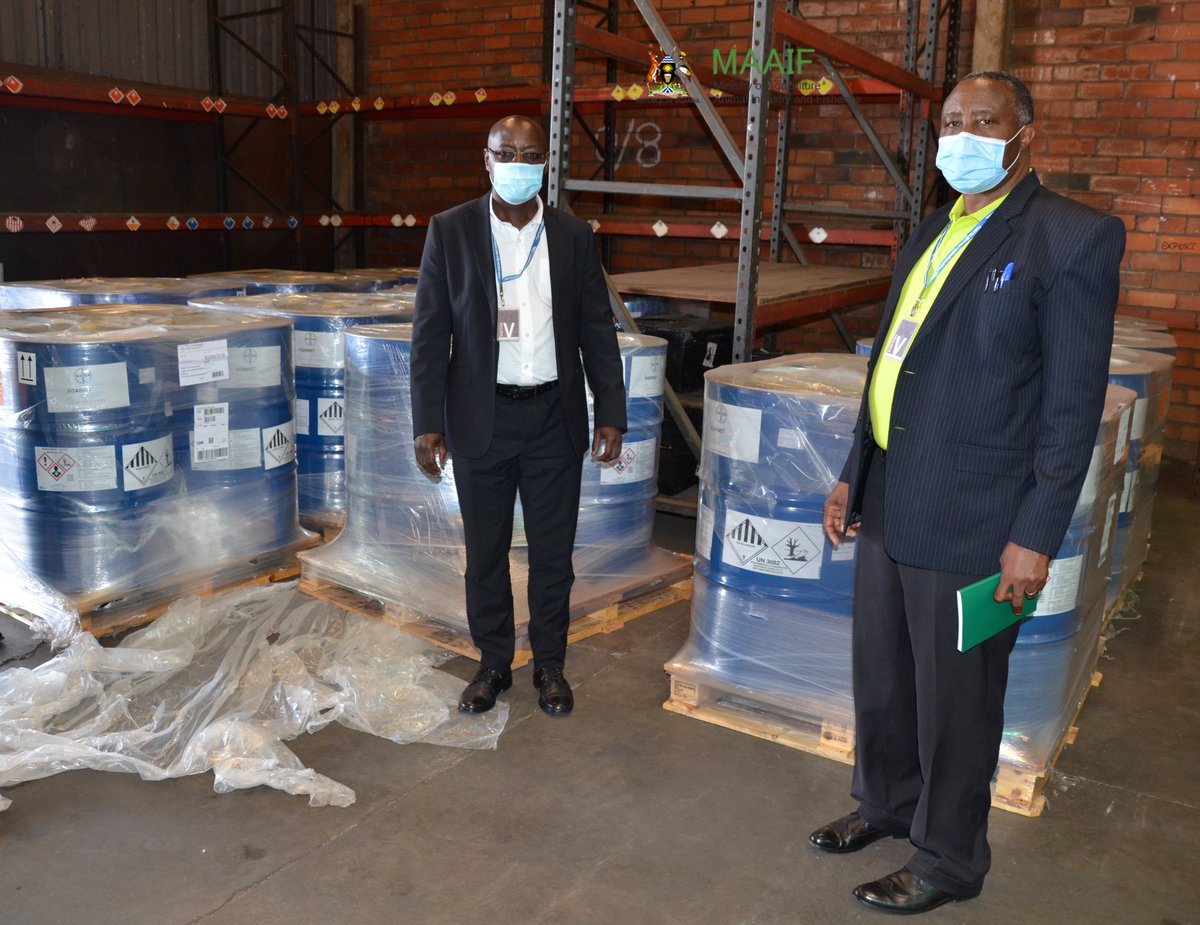 MAAIF_Uganda's tweet photo. The Inter-Ministerial Task Force for Desert Locust Control has been represented by MAAIF Permanent Secretary Mr. Pius Wakabi Kasajja and Mr. Stephen Byantwale the Commissioner for Crop Protection in receiving 50,000 litres of pesticide for @UGLocustControl from @Bayer4Crops https://t.co/ScRgsxcS3U