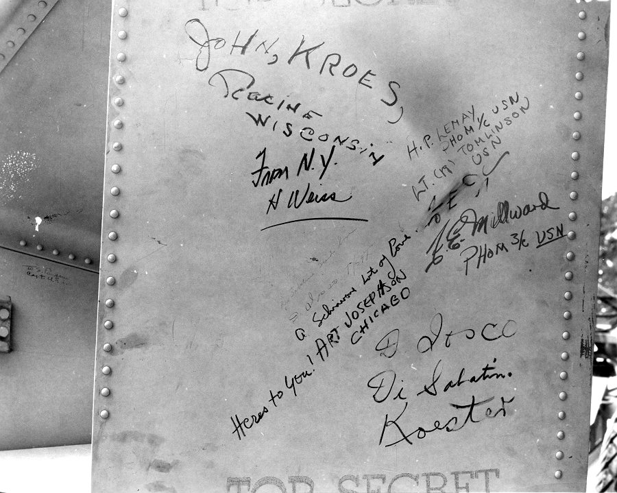 27/61Some 10 feet in length and half as much in diameter, the stout barrel weighed over 10k pounds and had, among other things, "Here's to you!" written on its side. Deep inside, it housed about 13 pounds of enriched plutonium-239 ringed by 64 timed explosives.