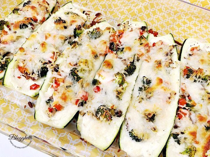 Blogghetti's tweet photo. These vegetarian stuffed zucchini boats have three kinds of cheese and a layer of delicious vegetables. Perfect for meatless meals or as a side. #zucchini #cheese #vegetables #farmersmarketweek #stuffedzucchini #vegetarian https://t.co/kE8bwCDmdF https://t.co/rw4RUJ8t98