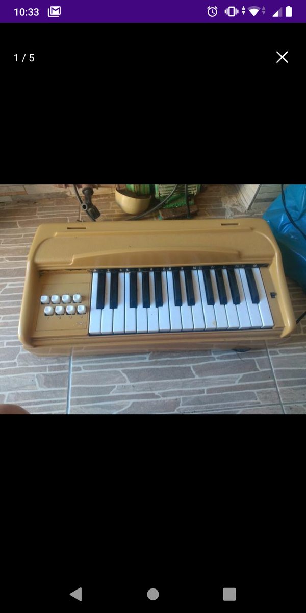 Alguém aqui que já teve ou pelo menos sabe o que é esse brinquedo/instrumento pode me descrever ele, por favor?
